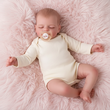 Kamil in cream onesie